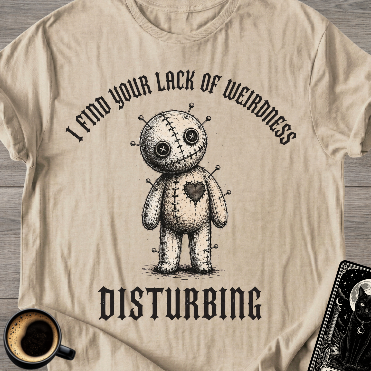 Lack Of Weirdness Voodoo Doll T‑Shirt